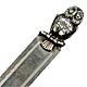 This bookmark was imported into Sweden. It has the Swedish import marks (three crowns and the letter S). It is also marked 830S. The top is an owl sitting on a branch. The date is 1920 - 1930.