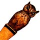 This bookmark was made in the US by an unknown manufacturer. It is made of wood and has a hand carved owl at the top. Date is unknown.