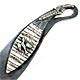 This bookmark was made in the US by an unknown manufacturer. It is marked only sterling. The top blade has a flying bird. The date is 1900 - 1910.