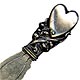 This bookmark was made in the US. It is unmarked except for the word sterling on the back of the top and was manufactured by Webster Company in 1913 and was sold as a letter opener. The top is a heart with flowers. The blades are silver plate.  