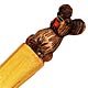This bookmark was made in the Germany by an unknown manufacturer. It is made of wood with a hand carved dog on the top. It is unmarked and is probably dated from 1910 - 1930.