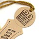 This bookmark was made in the US by an unknown manufacturer. It was made fairly recently of a beige colored plastic. It has the Ten Commandments in Hebrew on top and the words 'May The Good Lord Guard You From All Evil'" on the inner blade.  "