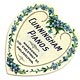 This bookmark was made in the US by Meek Company of Coshocton, D. It is a celluloid advertising bookmark for Cunningham pianos. It is in the shape of a heart with blue flowers along the outside edge. On the back is a picture of an upright piano with the words, "Buy the Matchless Cunningham Piano. We offer $10,000 for a better piano." The date is 1900 - 1915.