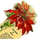 This bookmark was made in the US and is marked "Design copyrighted by Allan Sutherland, 1912." It is a quote from Henry van Dyke titled "Footpath to Peace."
