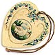  This bookmark was made in the US by an unknown manufacturer. It is a celluloid advertising bookmark for Geo. A Otis Co. of Buffalo, NY. It is in the shape of a heart with the outside decorated with blue flowers. The center blade has a picture of a duck. The date is 1905 - 1915.   