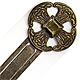 This bookmark was made in England between 1900 - 1910. It is made of silver plate over brass. The top is the Canterbury Cross and is marked as such on the back.  