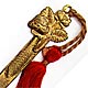  This bookmark was made in France between 1900 - 1910. It is made of brass or bronze with a red tassel. The top is a figure of a strawberry with it's flower and leaves. 