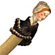  This bookmark was made in the US by an unknown manufacturer. It is a doll bookmark with a velvet cape. The front is marked Bernadette and Max. The date is 1875 - 1890.    