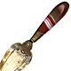  This bookmark was made in Scotland. It is made of brass and has an agate handle. It is in the shape of a trowel, a possible Masonic piece. The date is 1920 - 1930.  
