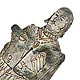  This bookmark was made in the US. It is a figural shape of Shakespeare reading a scroll. It is silver plate and the date is unknown.   