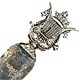 This bookmark was probably made in a Spain. It is marked sterling 925 and has a figural lyre on top. The date is unknown.