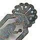 This bookmark was made in Mexico probably between 1980 - 1990. It is made of silver and is marked Mexico Sterling on the back. It is a figural of a dancer with the top being the head piece for the Fiesta de los Quetzales.