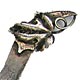  This bookmark was made in the US by an unknown manufacturer. It is marked only sterling on the back. It has a curved shaped blade with a figural of leaves as the top blade. The date is 1900 - 1910.  