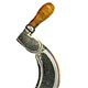  This bookmark has an amber handle and silver plate blades. It is in the shape of a sickle. It was probably made in a European country about 1920 - 1930.   