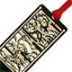 This bookmark was made in Japan. It is marked 24KGP for 24 karat gold plate. It is a very delicate cut-out design of an old tree. The date is 1998.