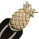 This bookmark was made in the US by an unknown manufacturer in 1999. It has a pineapple on the top and is gold plated.  