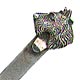  This bookmark was made in the US by an unknown manufacturer. It is marked only Sterling on the back. The top blade has a figure of a Scottie dog. The date is 1900 - 1910. 