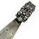 This bookmark was made in a South American country or Guatemala. It is marked 900 on the back for 900 fine silver. (Sterling is 925). It is an Aztec figural on the top with a piece of unpolished turquouise. The date is 1960 - 1970.  