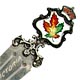 This bookmark was made in Canada between 1940 - 1960. It is marked Sterling on the back and has an enamel maple leaf in mulitple colors on the top. The top blade is inscribed Victoria.  