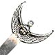 This bookmark was made in the US by an unknown manufacturer. It is possibly Shiebler. It is marked Sterling 1638 on the back. The top is the face of an angel with finely detailed expanded wings. The date is 1880 - 1900.  