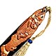 This bookmark was made in Japan, is unmarked and made of copper and brass. The top blade is copper and depicts a fish with rats running on and around it. The bottom blade is brass. The top has it's original tassel with a small blue bead. The date is 1900 - 1910.