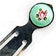 This bookmark was made in the US by an unknown manufacturer. It is marked only sterling. The top is enamel and has a picture of a flower. The date is 1900 - 1910.
