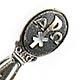 This bookmark was made in the US by Creed. It is marked Creed Sterling on the back. The top has some greek letters, alpha and omega with another symbol between them. The date is 1970 - 1980.