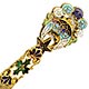This bookmark was made in France by an unknown manufacturer. It is a colorful enamel and brass cloisonne piece know as Battersea. The date is 1900 - 1910.