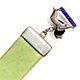  This bookmark is made of green celluloid and sterling silver. It is marked sterling silver and has a Patent number 212101. It was patented on March 2, 1923 by A. J. Smith of Variety Works, Fredrick Street, Birmingham, England. The top is a silver and enamel lion with the words Wembley - 1925.    