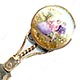  This bookmark was made in Europe, possibly France. The top is a hand painted porcelain medallion with a couple in 18th century garb. It is a brass bookmark with a dore finish. The date is 1870 - 1900.  
