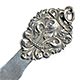 This bookmark was made in the US by an unknown manufacturer. It is marked sterling 1603 on the back. It is a large piece with an art nouveau design as the top blade. The date is 1900 - 1910.