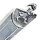  This bookmark was made in a Scandinavian country and imported into Sweden. It is marked 830S and has the Swedish import marks. The top is a little girl carrying an umbrella. The date is 1950 - 1970.   