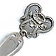 This bookmark was made in the US by an unknown manufacturer. It is marked sterling on the back. The top is an art nouveau design of a flower.    