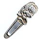  This bookmark was made in Mexico. It is marked Janna Sterling Mexico on the back. The top is a figural lion reading a book. The date is 1970 - 1980.    