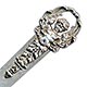  This bookmark was made in the US by an unknown manufacturer. It is unmarked and is either silver or peweter. The top is a winged cherub which extends down to become the top blade. The date is unknown.     