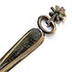  This bookmark was made in Europe by an unknown manufacturer. It has a manufacturers hallmark on the back. It is long and thin and doubles as a letter opener. The date is unknown.   