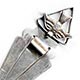  This bookmark was made in and unknown country, possibly somewhere in South America. It is marked on the back with what looks like a rubbed out 925 for sterling but it is not clear. The top is a detailed figural of a flying bird within a triangle. The date is unknown.   