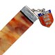  This bookmark was made in Europe. It is marked sterling silver and is made of celluloid or bakelite. The top has an enamel shield that says Jersey at the top. The date is 1910 - 1930.  