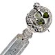  This bookmark is made in Birmingham, England. The manufacturer is JC&amp;S. The top is an intricate design including a shamrock with green agate stones.  The date is 1906.  